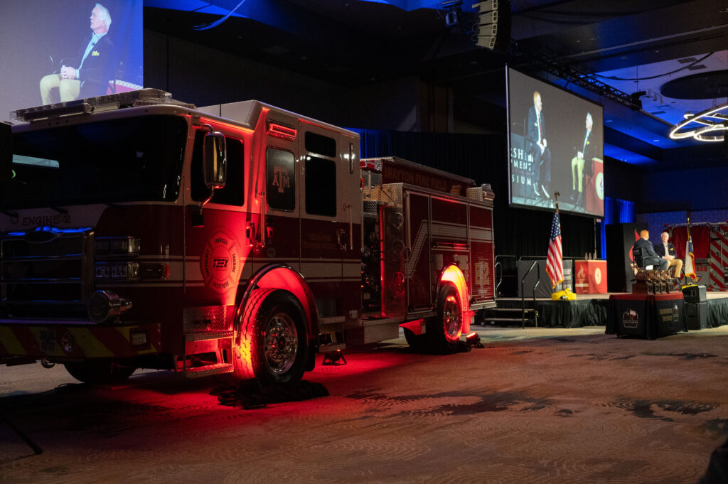 fire truck parked next to stage